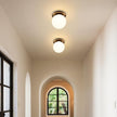 Modern Glass Globe Wall Sconce: Black Single Light with Milk Glass Shade - Minimalist Spherical Vanity Sconces Over Mirror - Contemporary Ball Wall Lights Fixtures for Entryway Bedside Bulb Excluded