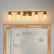 PAZALA Brushed Brass Bathroom Light Fixtures Over Mirror 5-Lights Vanity Light Wall Sconce with Globe Glass Shade E26 Base Perfect for Hallway Picture Wall Lighting Bathroom Bedroom Mirror Living Room