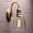 Yosoan 1-Light Brass Modern Vintage Indoor Wall Sconce, Vanity Single Luxury Hardwired Retro Textured Clear Oval Cone Glass Shade with Industrial Curved Rod Bathroom Lamp(Antique)