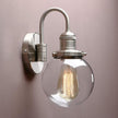 Yosoan 1-Light Vintage Industrial Fixture Light, 5.9'' Round Globe Clear Glass Shade with Elegant Curved Rod Hardwired Wall Sconce for Bathroom Porch Kitchen Living Room Hotel Foyer(Brushed)